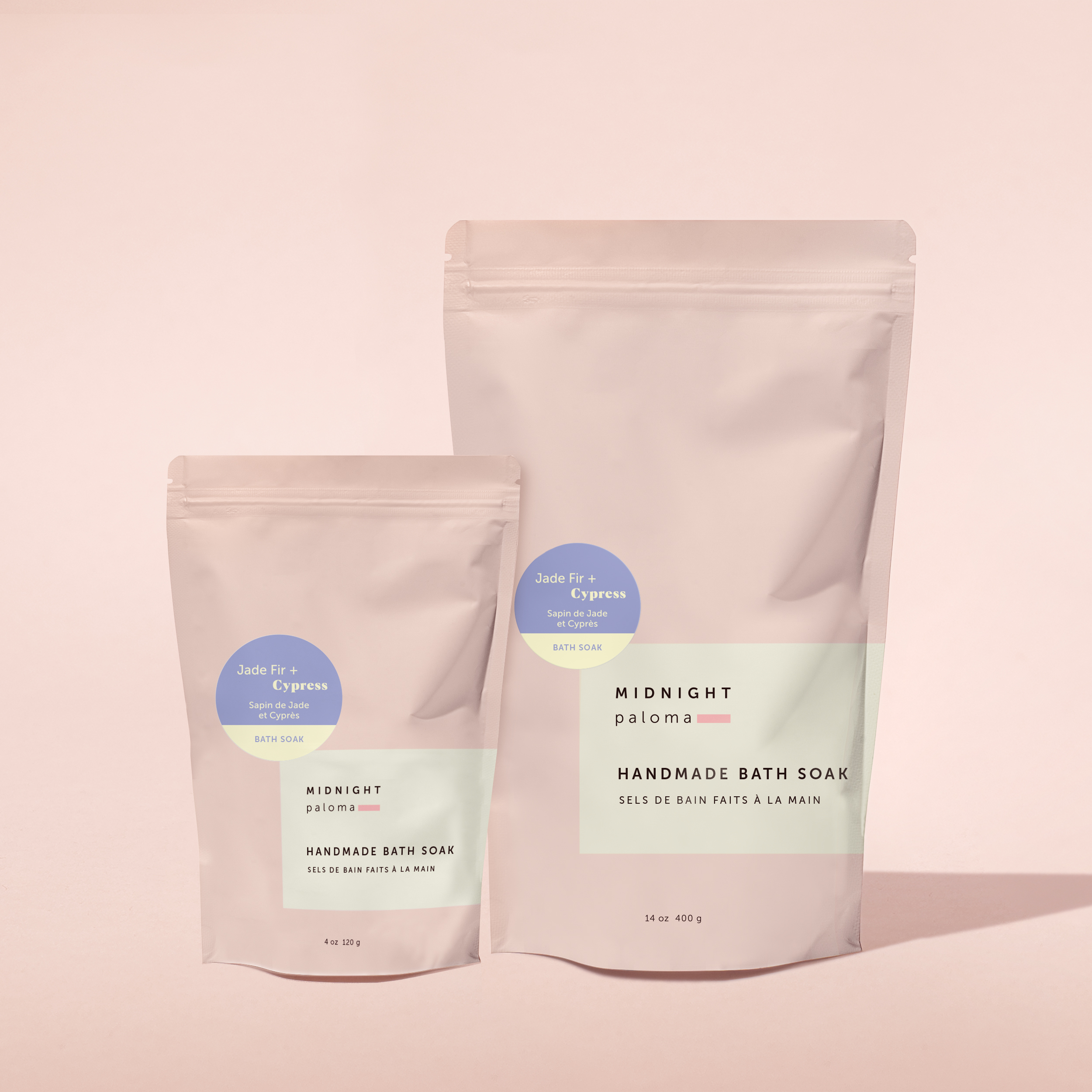 Midnight Paloma Jade Fir + Cypress Bath Soak in 4 oz and 14 oz resealable pouches. Minimalist packaging design by Danielle Gracioso on soft beige background.